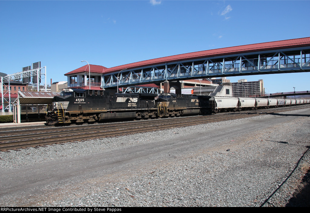 NS 4505 and 4348 take a string of covered hoppers west